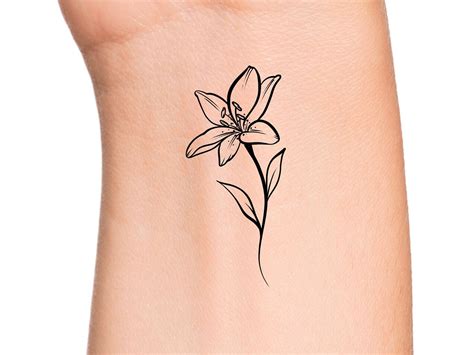 tiny lily tattoo|More.